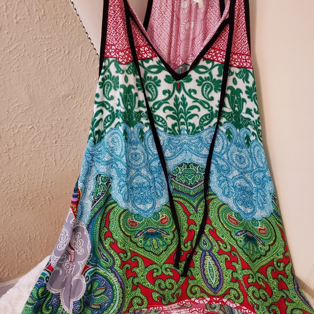 Super cute sleeveless top. Vibrant colors! Sz S